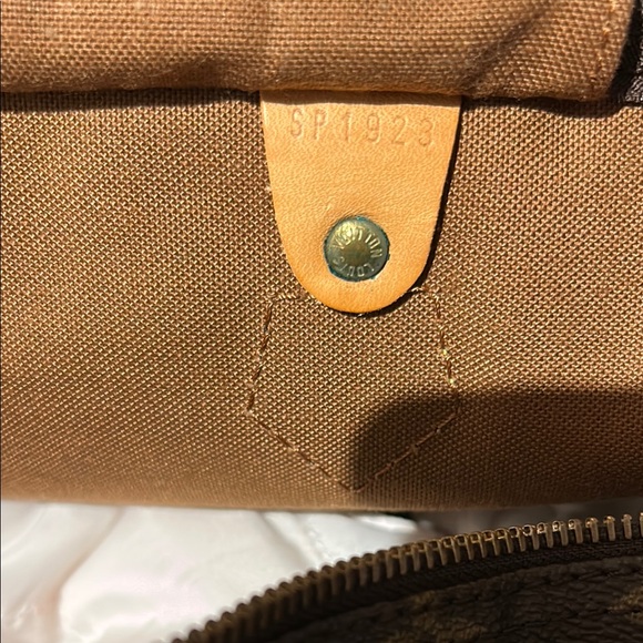 Louis Vuitton Brown Duffel Bag with Iconic Monogram and Leather Trim - Picture 13 of 16